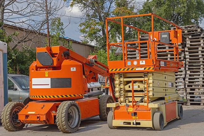 forklift transporting goods in a large warehouse in Dearing GA